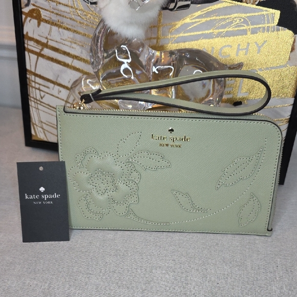 kate spade Handbags - Kate Spade Lucy Floral Applique L-Zip Wristlet
